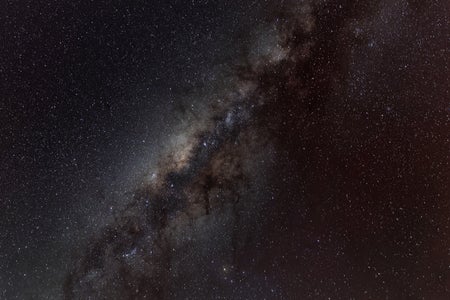 The Milky Way appears over the Valle de la Luna in the Atacama Desert,