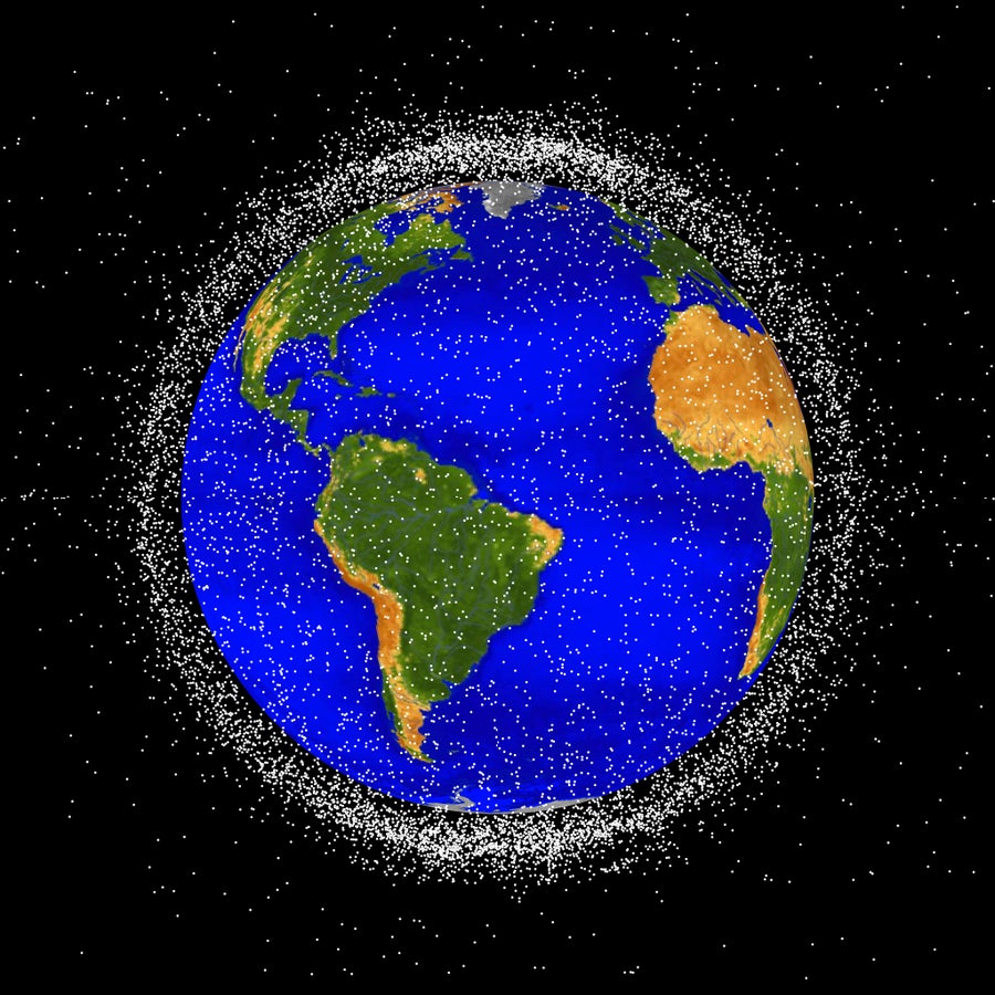 Graphic with computer generated images of objects in Earth orbit that are currently being tracked. Orbital debris is represented with white dots and are scaled according to the image size of the graphic